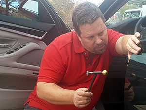 Scratch Master: Brian fixing Hail Damage.